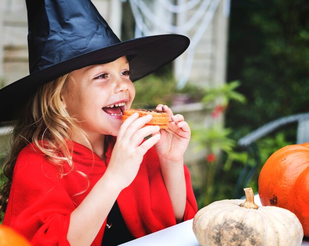 Little girl dressed up as a witch