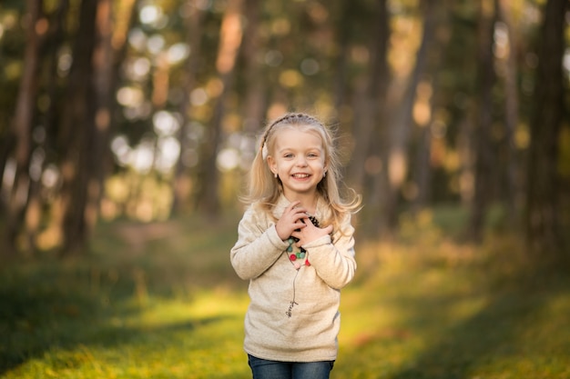 Little girl in forest