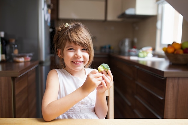 Little girl having healthy snack