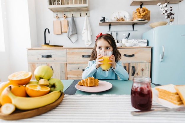 Little girl having her breakfast