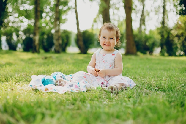 Little girl is resting in the park