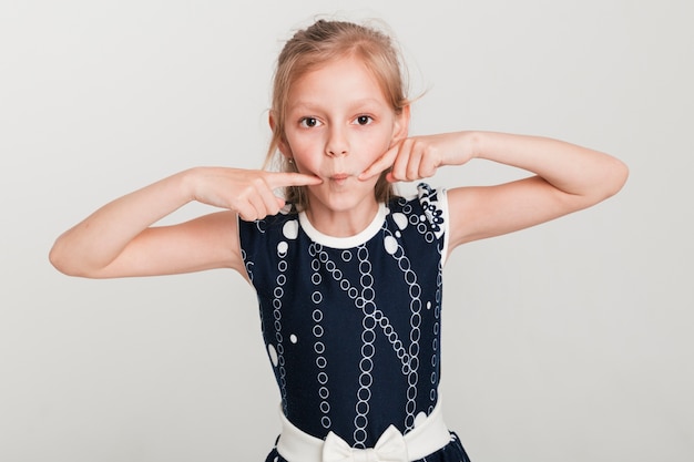 Little girl making foolish expression