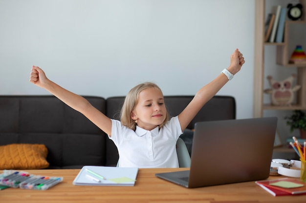 Little girl participating in online classes