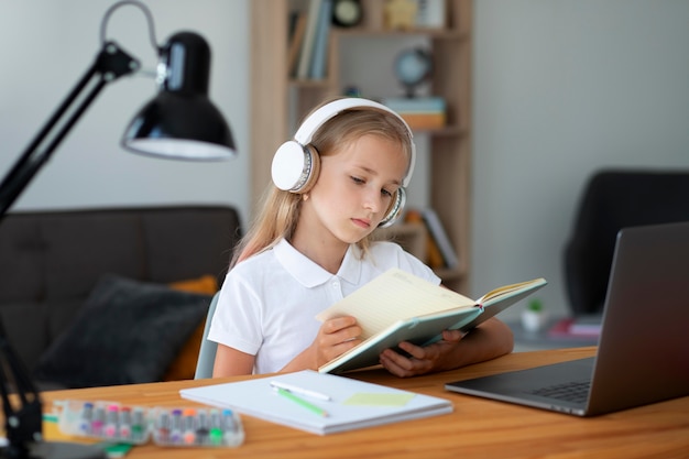 Little girl participating in online classes