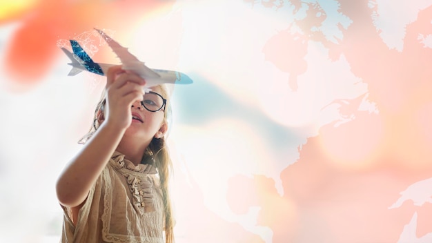 Free Photo little girl playing with a toy plane