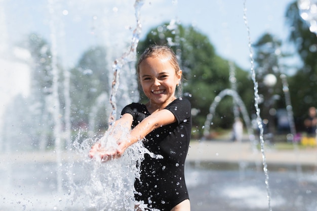 Little girl playing with water