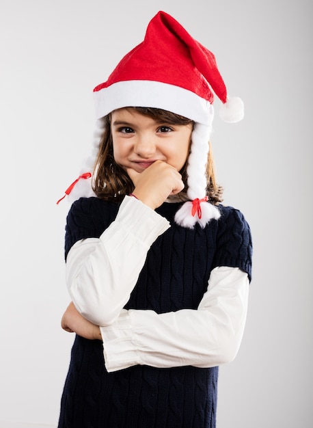 Free photo little girl thinking