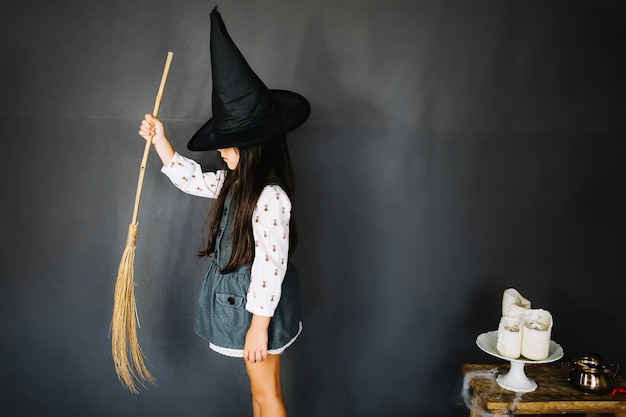 Free Photo little girl in witch hat