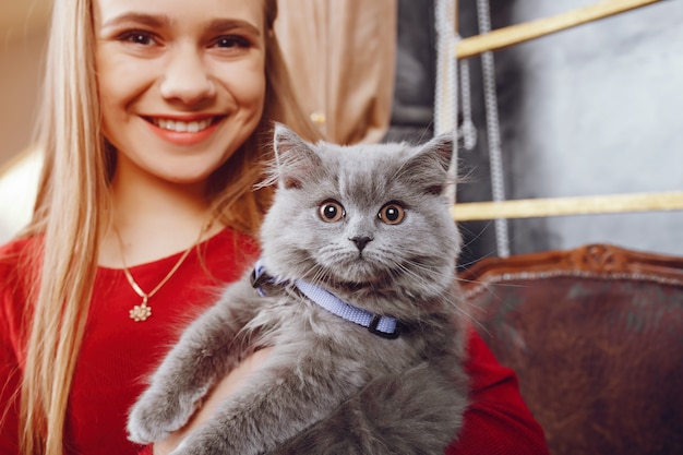 Free Photo little girl with cat