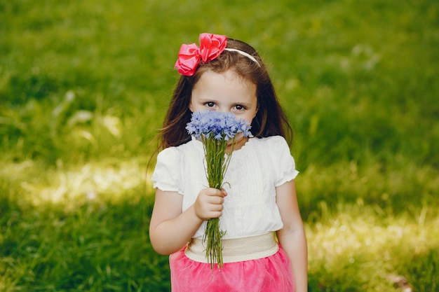 little girl with flowers