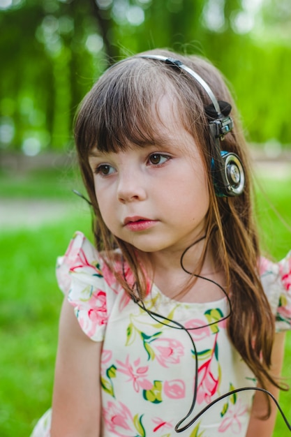 Little girl with headphones