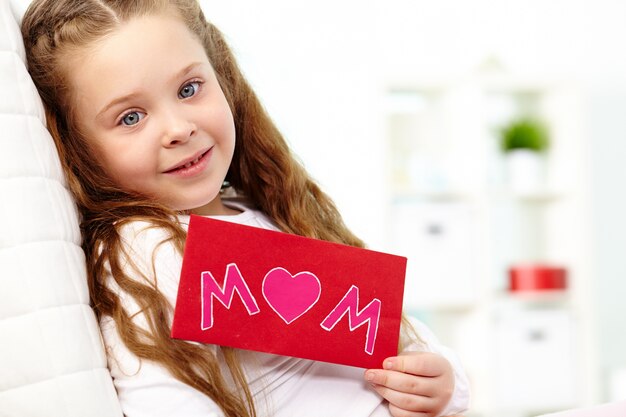 Little girl with a red envelope