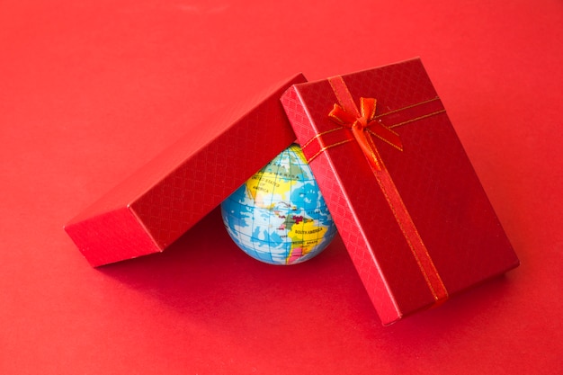 Free Photo little global map under present box