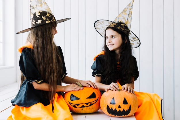 Free Photo little witches enjoying time at halloween party