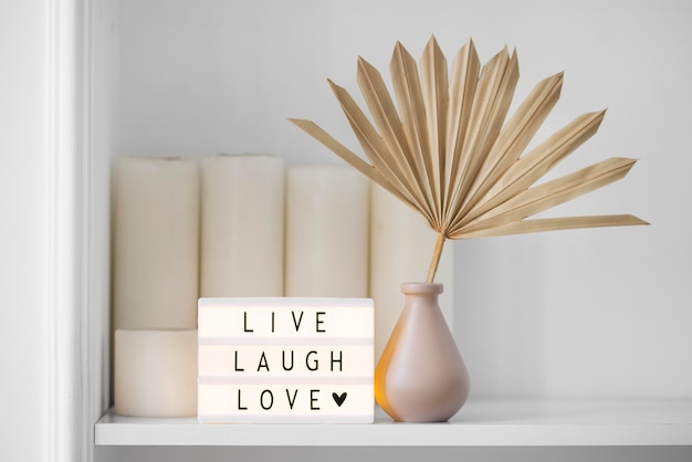 Free photo live laugh love message on lightbox