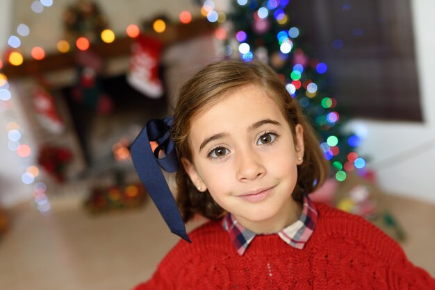 Llittle girl dressed in red 