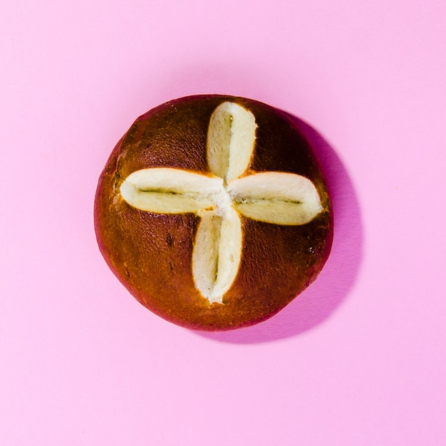 Free photo loaf of bread with color background