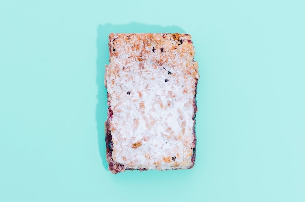 Free photo loaf of bread with color background