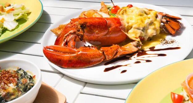 lobster thermidor and salad, macro closeup for food design work