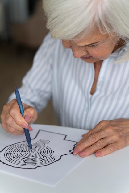 Free Photo lonely woman confronting alzheimer disease