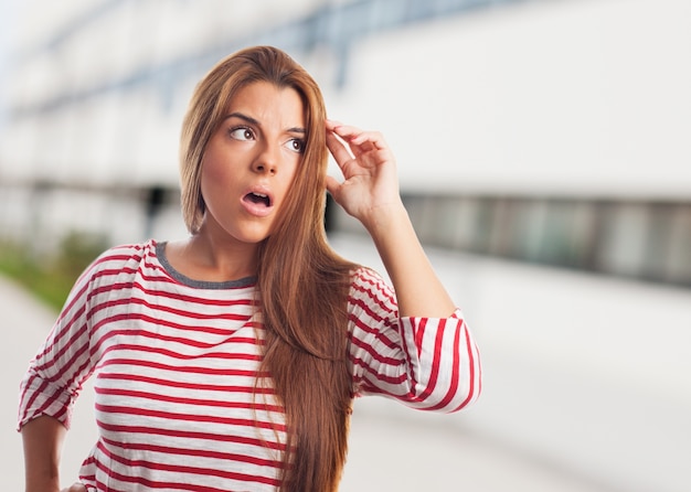 Free photo long-haired woman wondering.