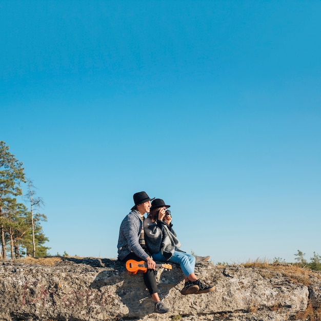 Long shot adorable couple outdoors