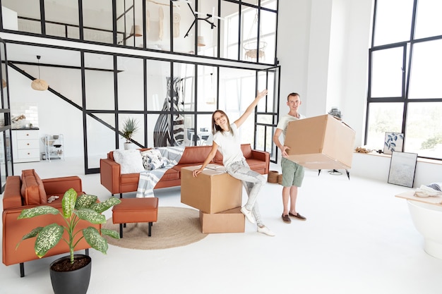 Long shot couple being happy about new house