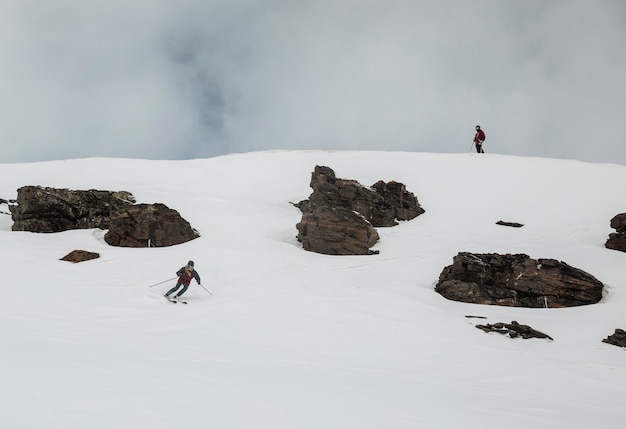 Free photo long shot skier wearing equipment