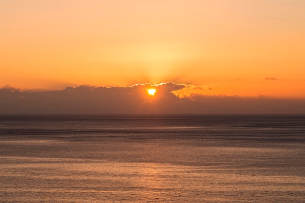 Long shot of sun set at the seaside