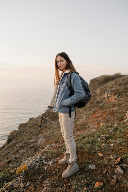 Long shot of woman enjoying the peace around her