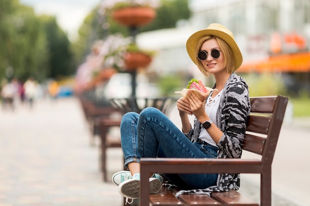 Long shot of woman looking at camera