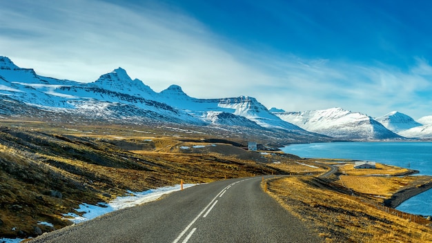 Free Photo long straight road in winter.