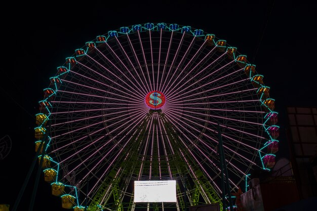 Long view colorful wonder wheel in the night