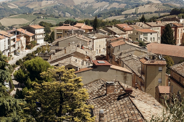 Free Photo look from above at red roofs of old italian town 