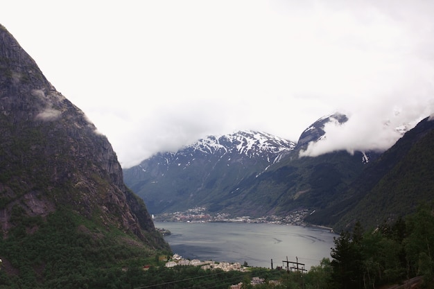 Free Photo look from the top and heavy clouds hanging over the fjords 