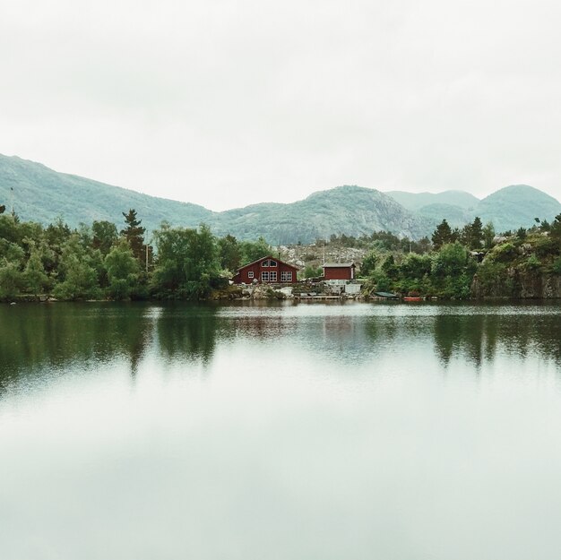 Look over the lake at lonely cabins on the shore