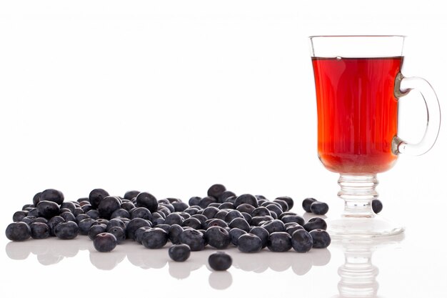 Lots of blueberries and a glass of tea