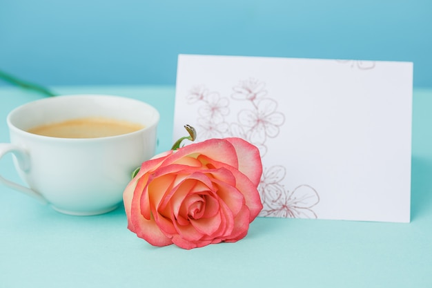 Love background with pink roses, flowers, gift on table