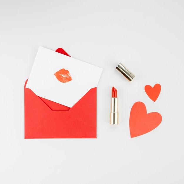 Love envelope and lipstick flat lay