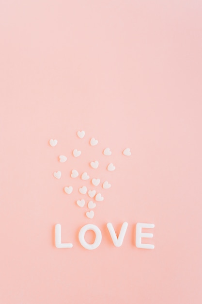 Free Photo love inscription with white hearts