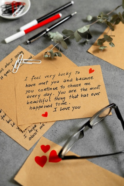 Free Photo love letter of note with collection of romantic stationery