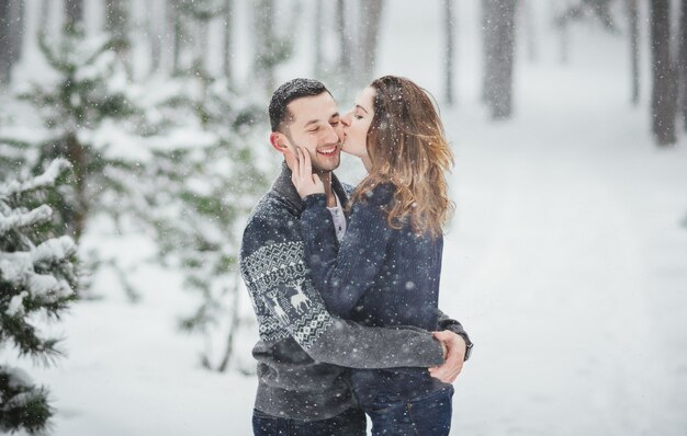 Love Story of a young couple in the winter.