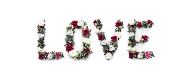 Free Photo love word made of flowers on white