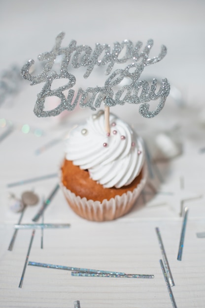 Free photo lovely birthday composition with cupcakes