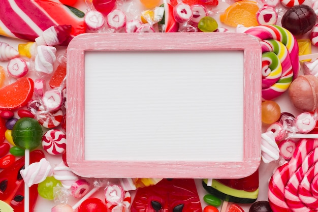 Free photo lovely candies frame with copy space