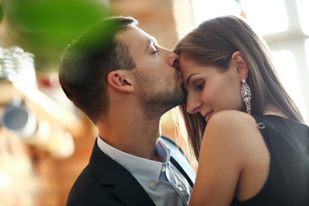 Lovely couple spending time together at home