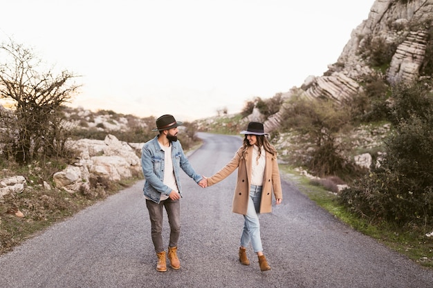 Lovely couple walking on a road