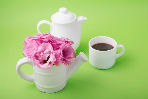 Lovely flowers concept with coffee cup