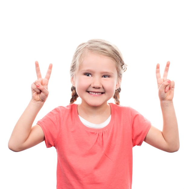 Free photo lovely girl showing victory sign