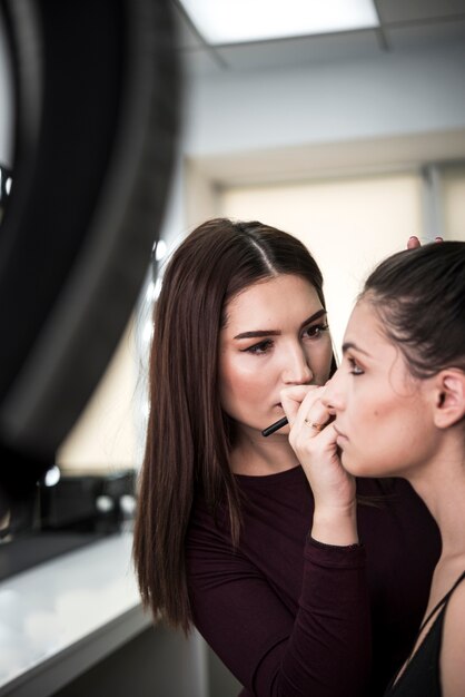 Lovely make up artist in studio